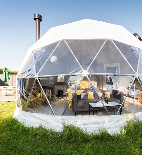 A dome from TruDomes setup for a dinning experience
