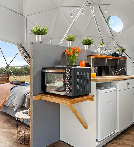 Inside of a dome looking at the luxury glamping accommodations