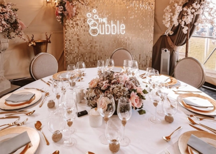 A table setup at The Bubble. A restaurant that uses TruDomes domes