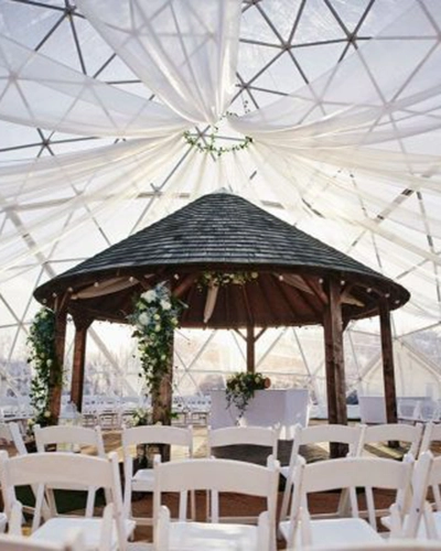 A Dome from TruDomes setup and decorated for a wedding